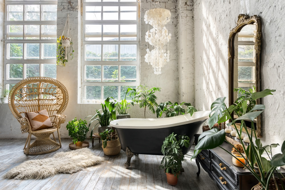 Quali sono i brand per arredare un bagno vintage? 9 Immagine di bagno con piante