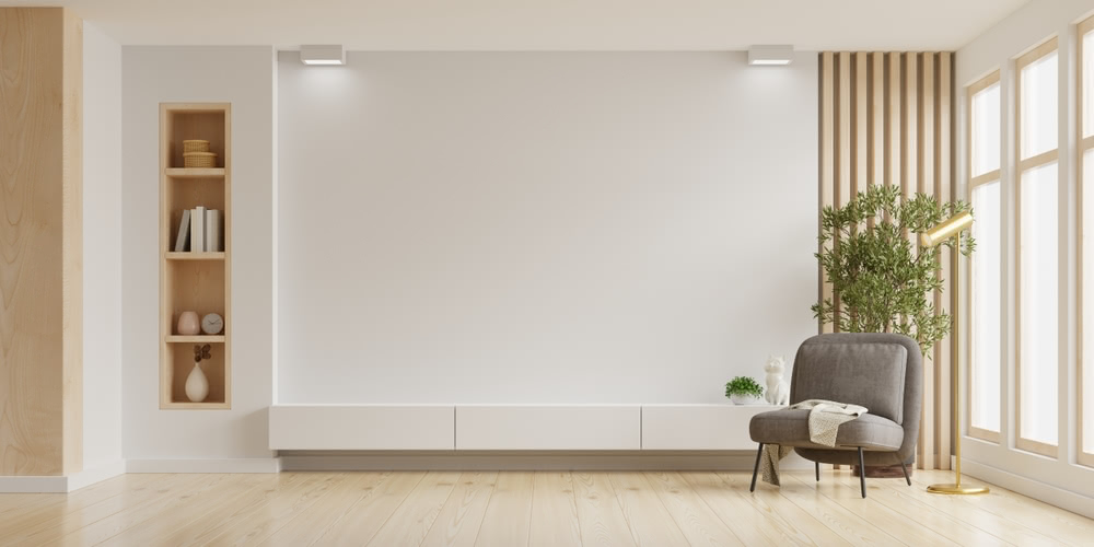 I consigli dell'architetto per riempire una parete vuota in salotto 1 Immagine di parete vuota
