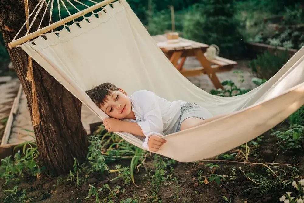 Bambini in casa: come adattare il giardino 4 Immagine di amaca bambini